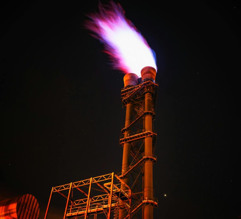 Low Angle View of Illuminated Tower Against Sky at Night