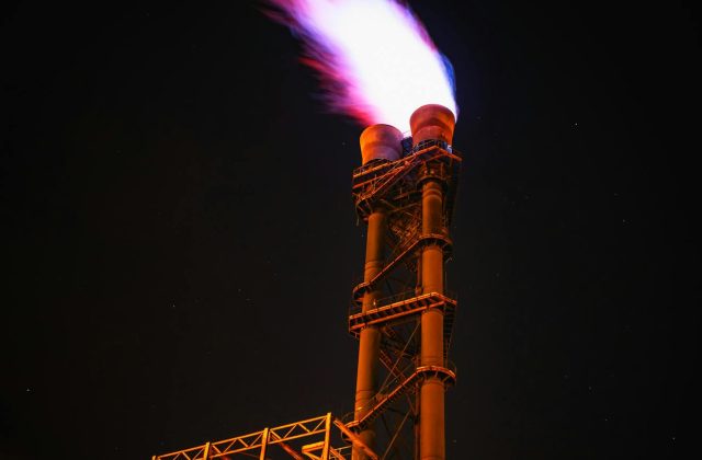 Low Angle View of Illuminated Tower Against Sky at Night